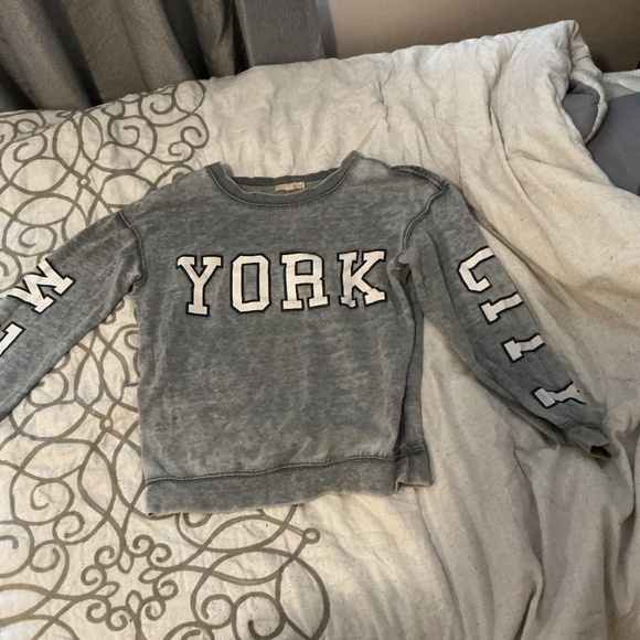 Garage Tops - A long sleeve crew neck sweater